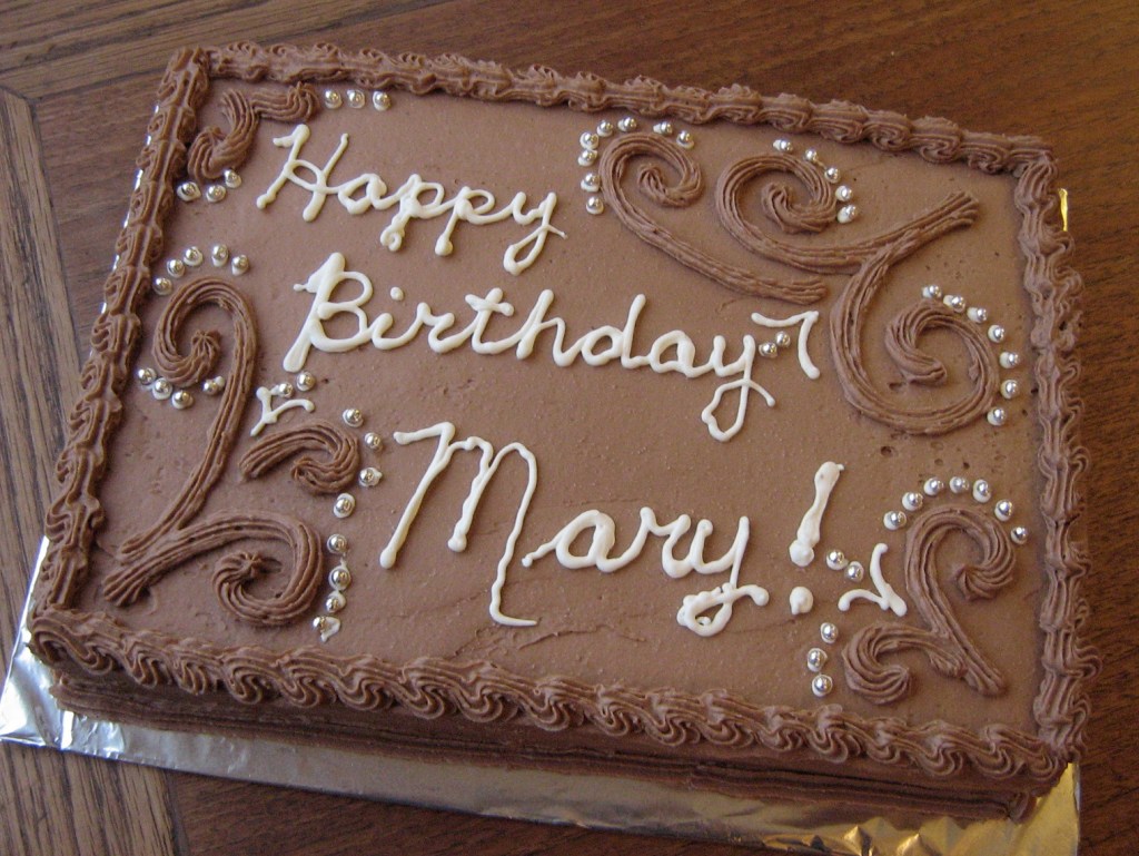 Pear-Filled Vanilla Birthday Cake with Chocolate Buttercream&nbsp;Frosting