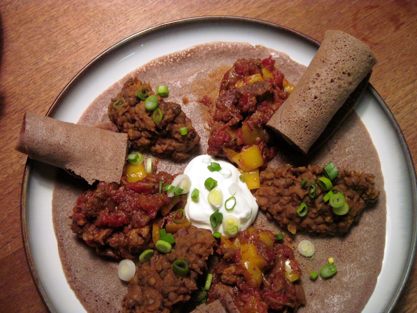 Ethiopian food platter with injera and traditional stews